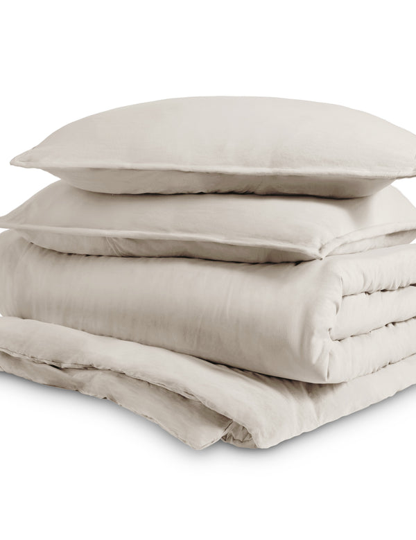 Washed duvet cover and sham set folded and stacked
