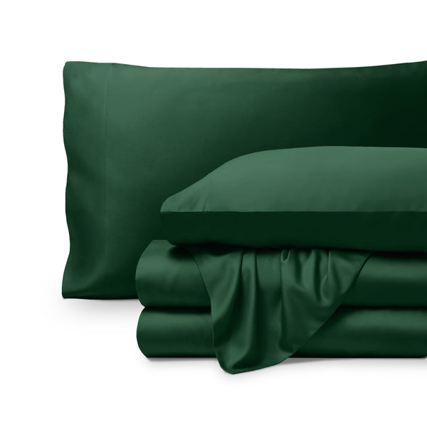 Bamboo pillowcases and sheets set on a white background