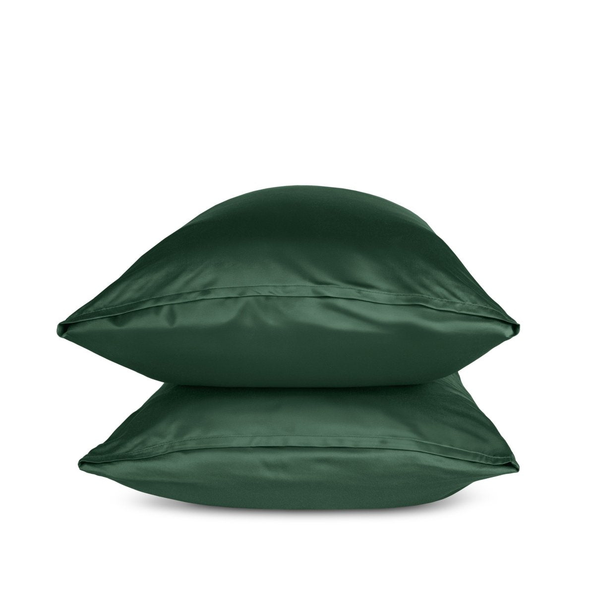 Two green pillows stacked on a white background