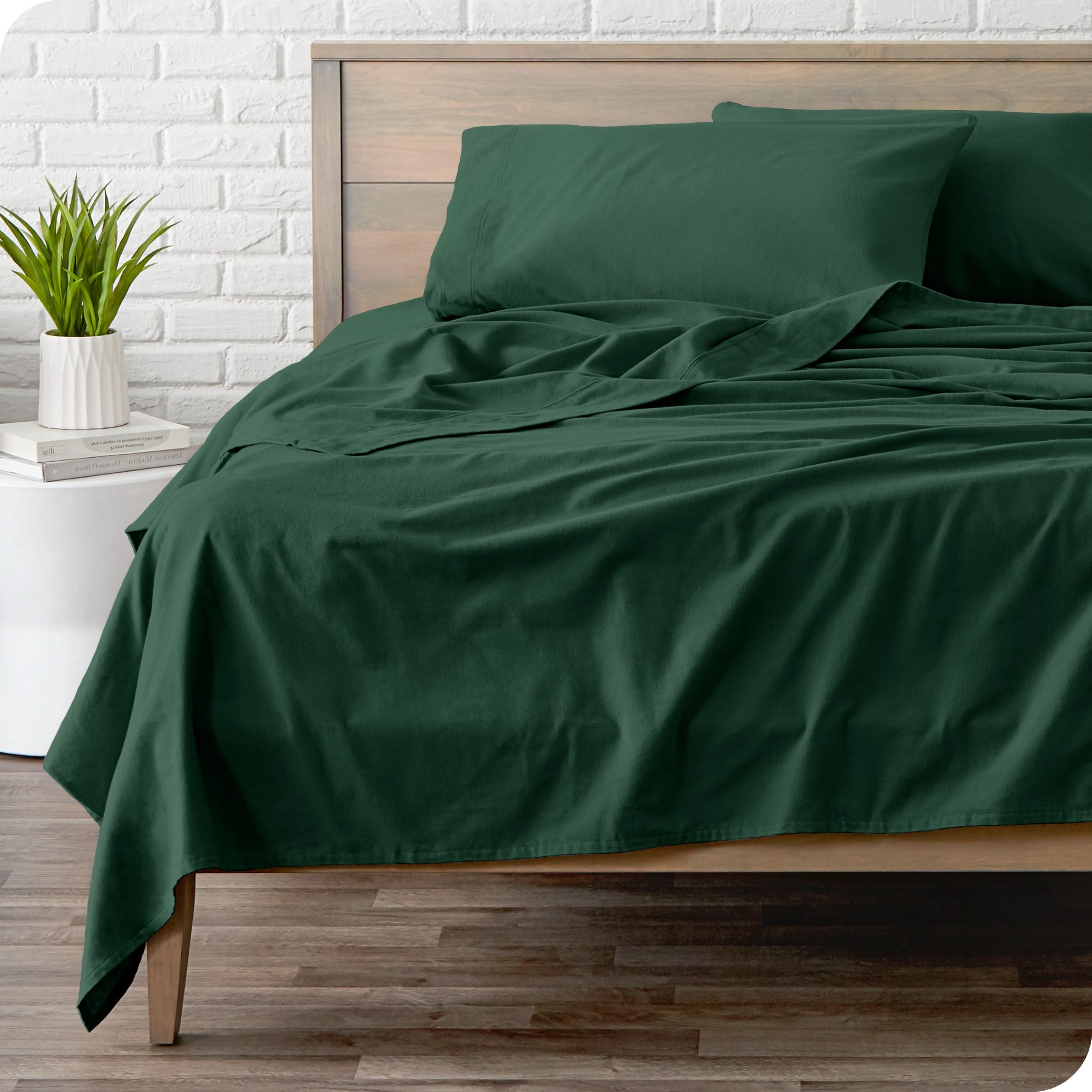 A modern bed with a flannel sheet set on