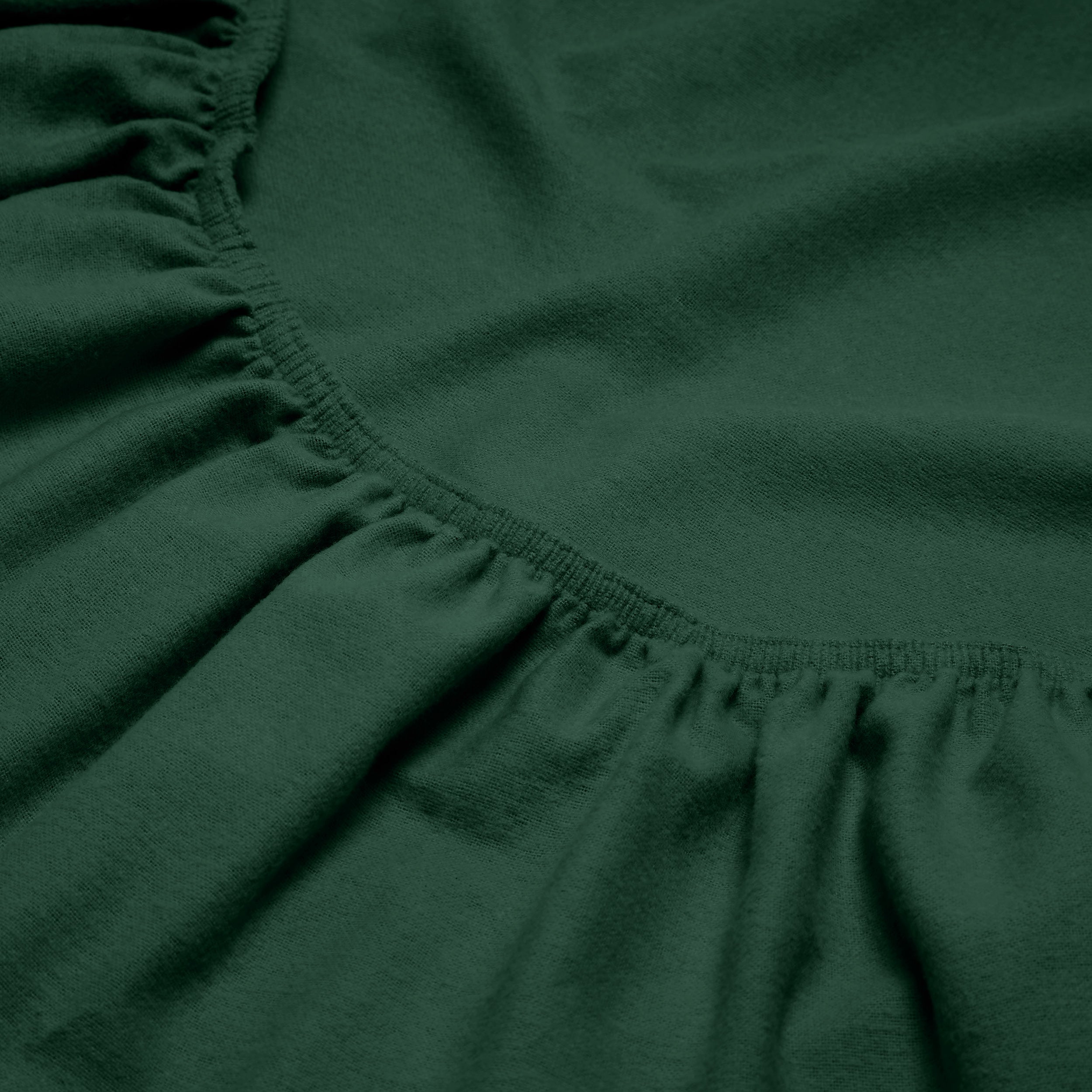 Close-up of a flannel fitted sheet with gathered elastic