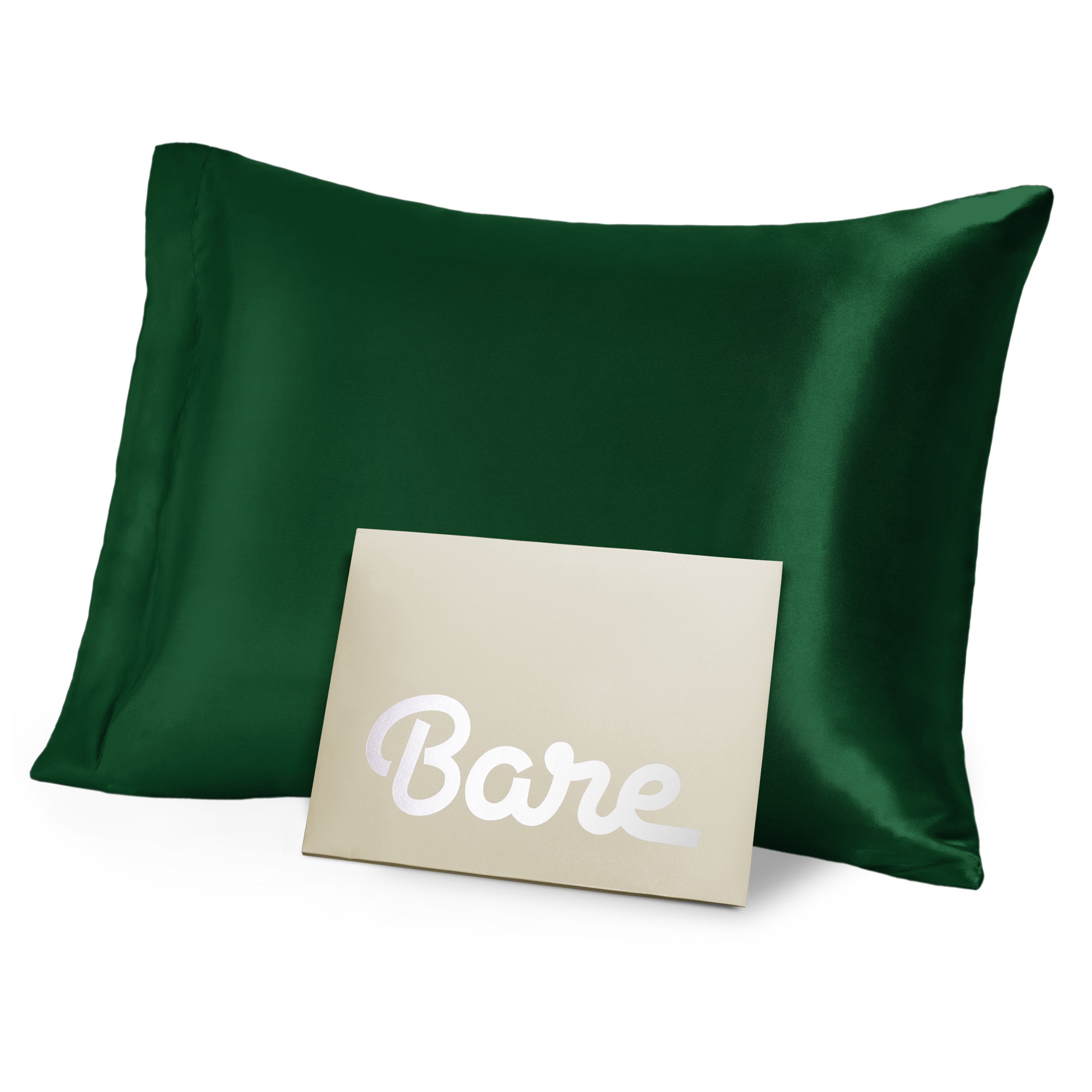 A green mulberry silk pillowcase on a pillow