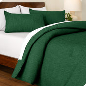 A comforter set on a bed