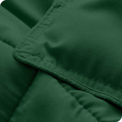 A close up of a corner of the microfiber comforter