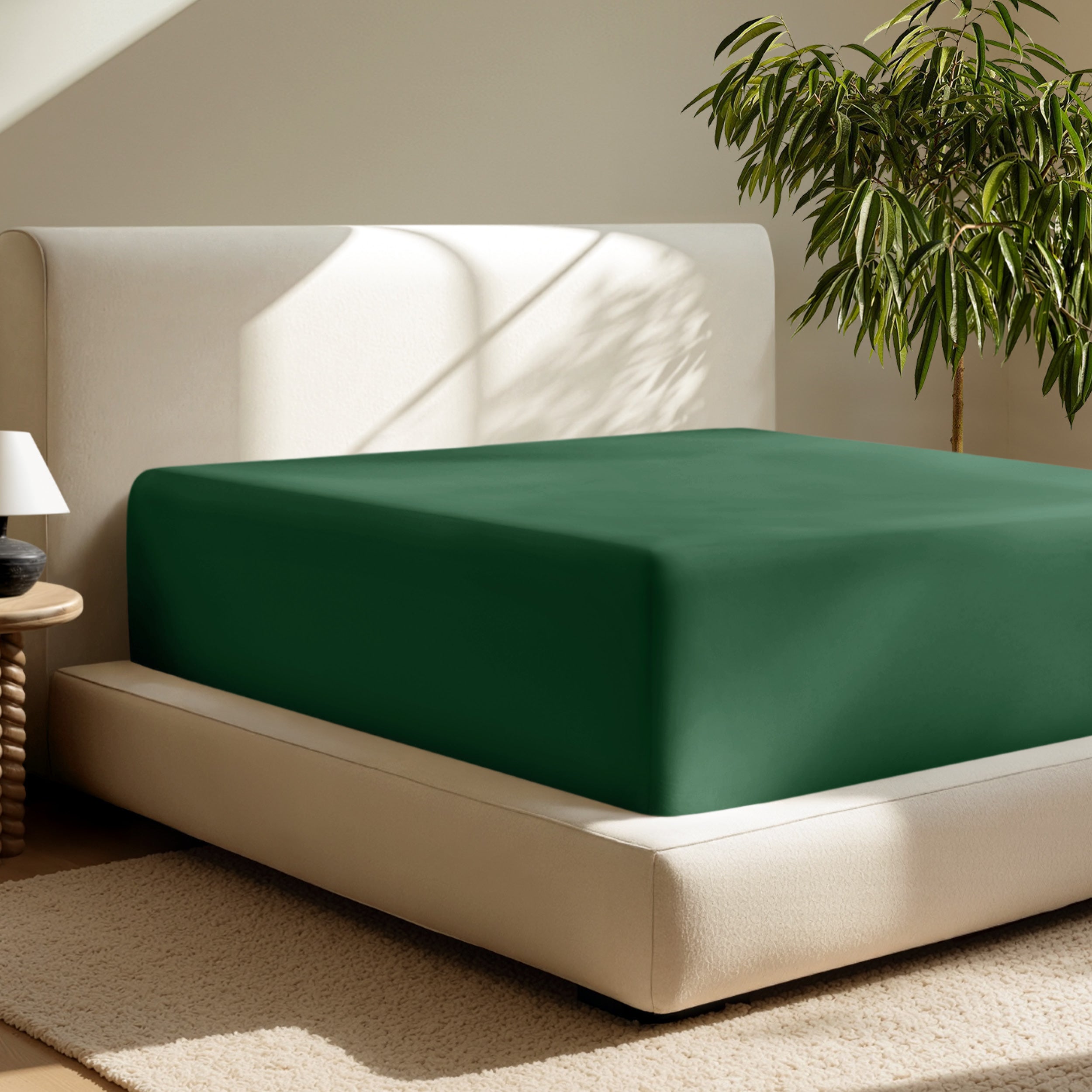 A deep pocket fitted sheet on a mattress