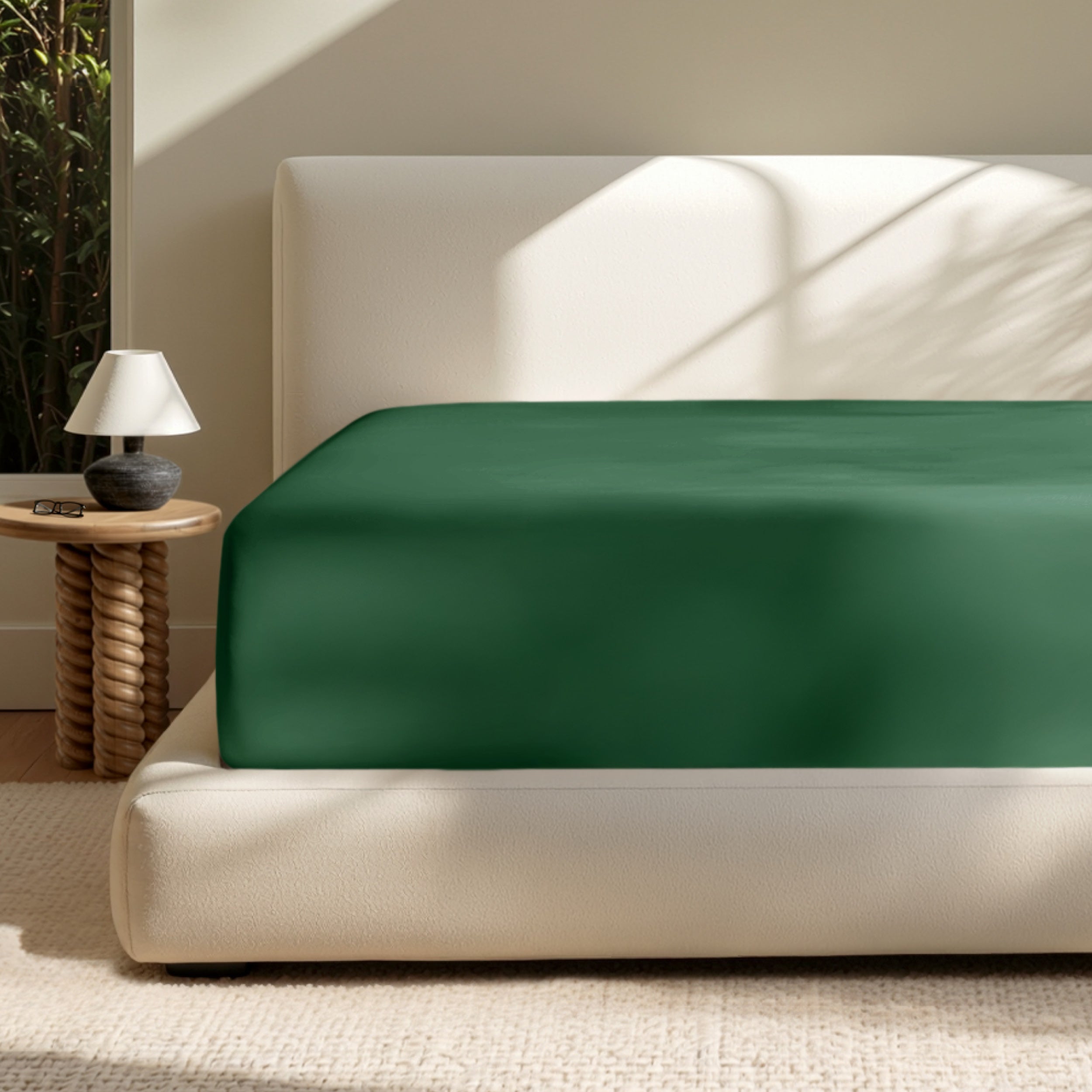 A deep pocket mattress with a fitted sheet on it