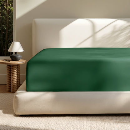 A deep pocket mattress with a fitted sheet on it