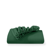 A fitted sheet folded neatly with the all around elastic showing