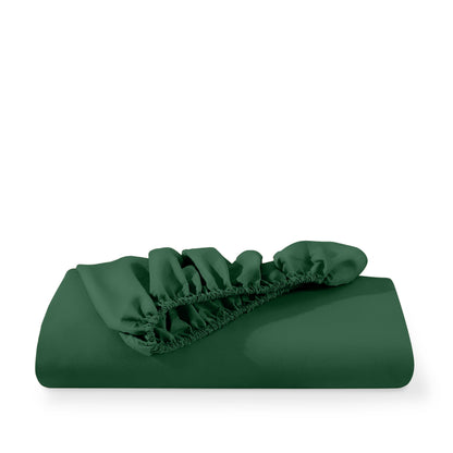 Microfiber fitted sheet folded with a white background