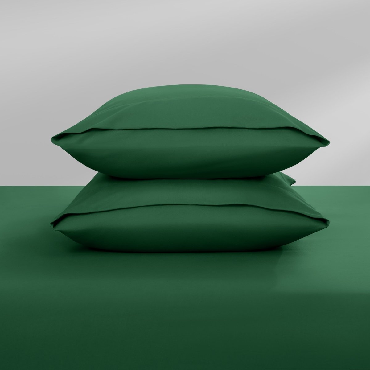 Two pillowcases on top of a bed