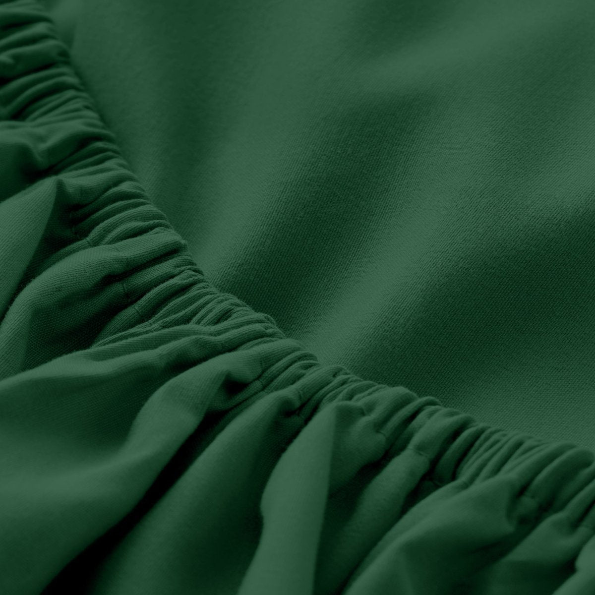 Close-up of elastic on a fitted sheet.