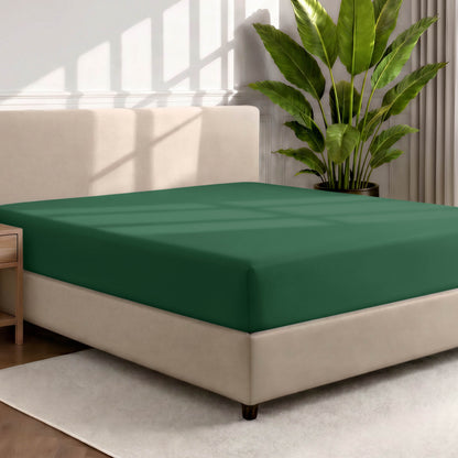 Ultra soft fitted sheet on a mattress with the sun shining into the bedroom