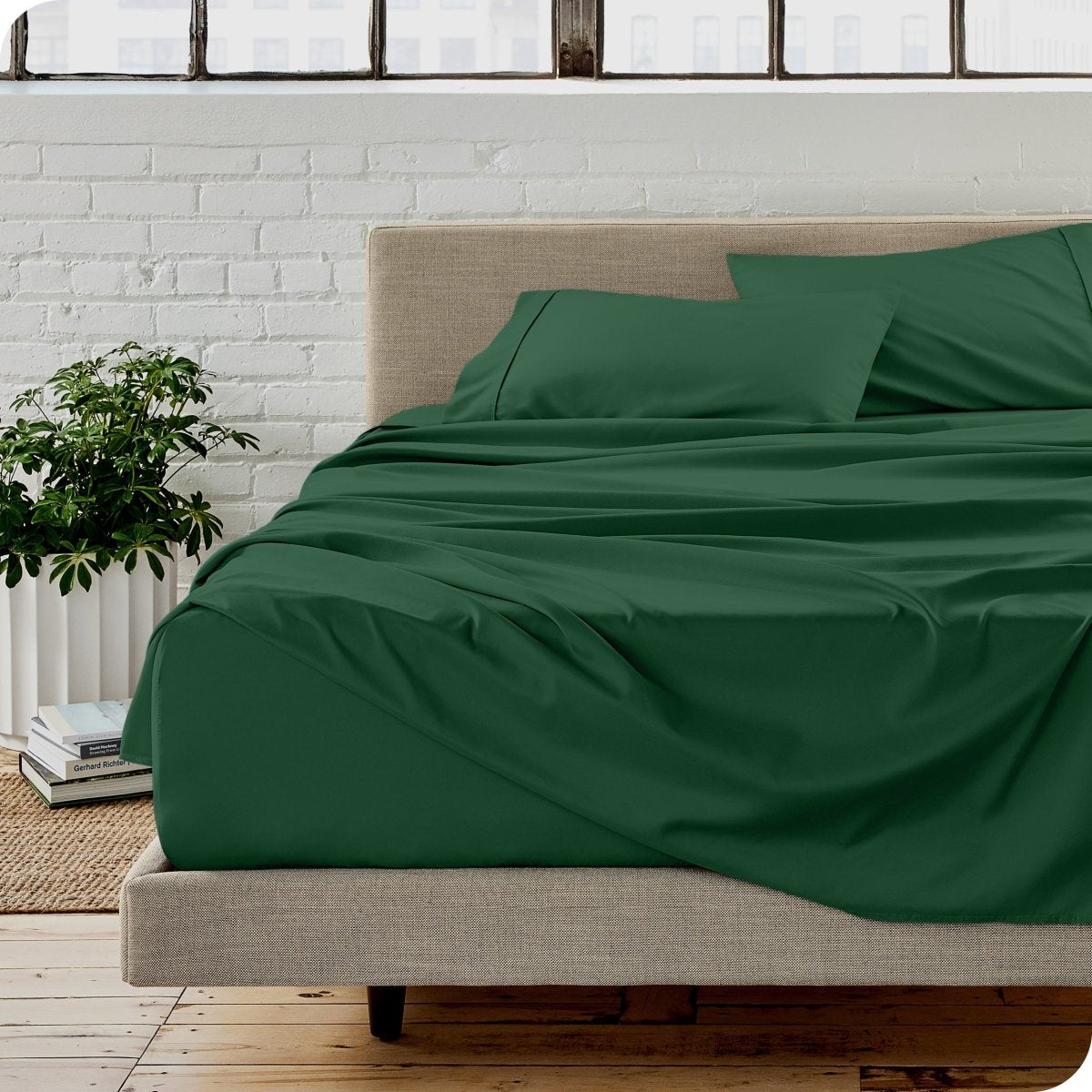 A modern bedroom with microfiber sheets on the mattress