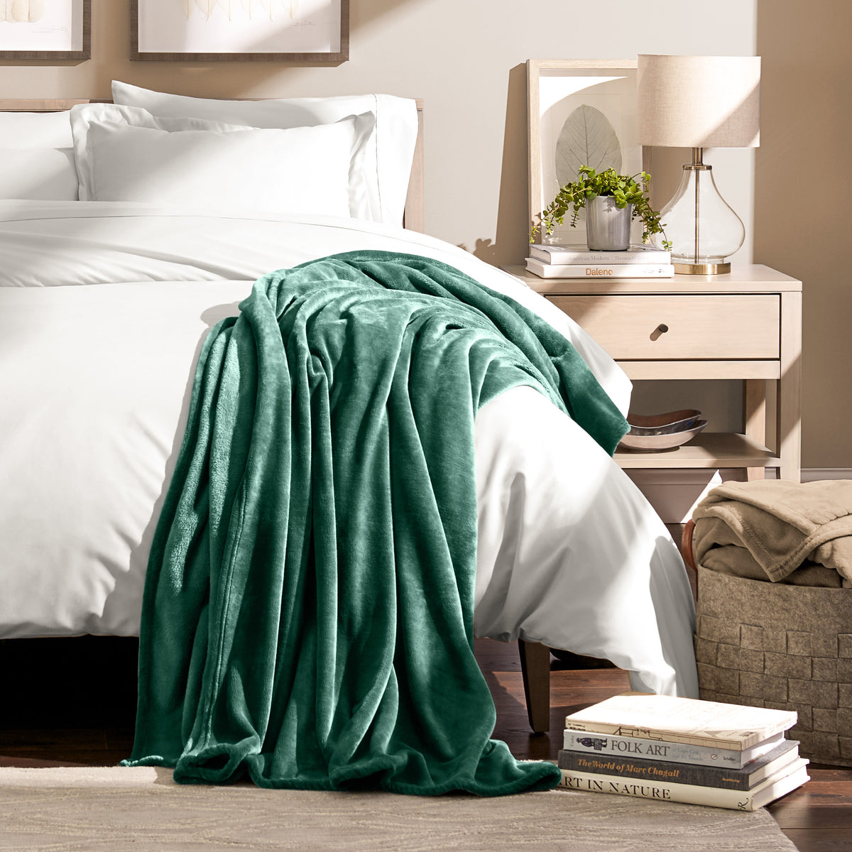 Microplush blanket draped over the corner of a bed