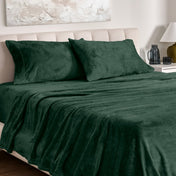 Microplush sheet set on a bed.