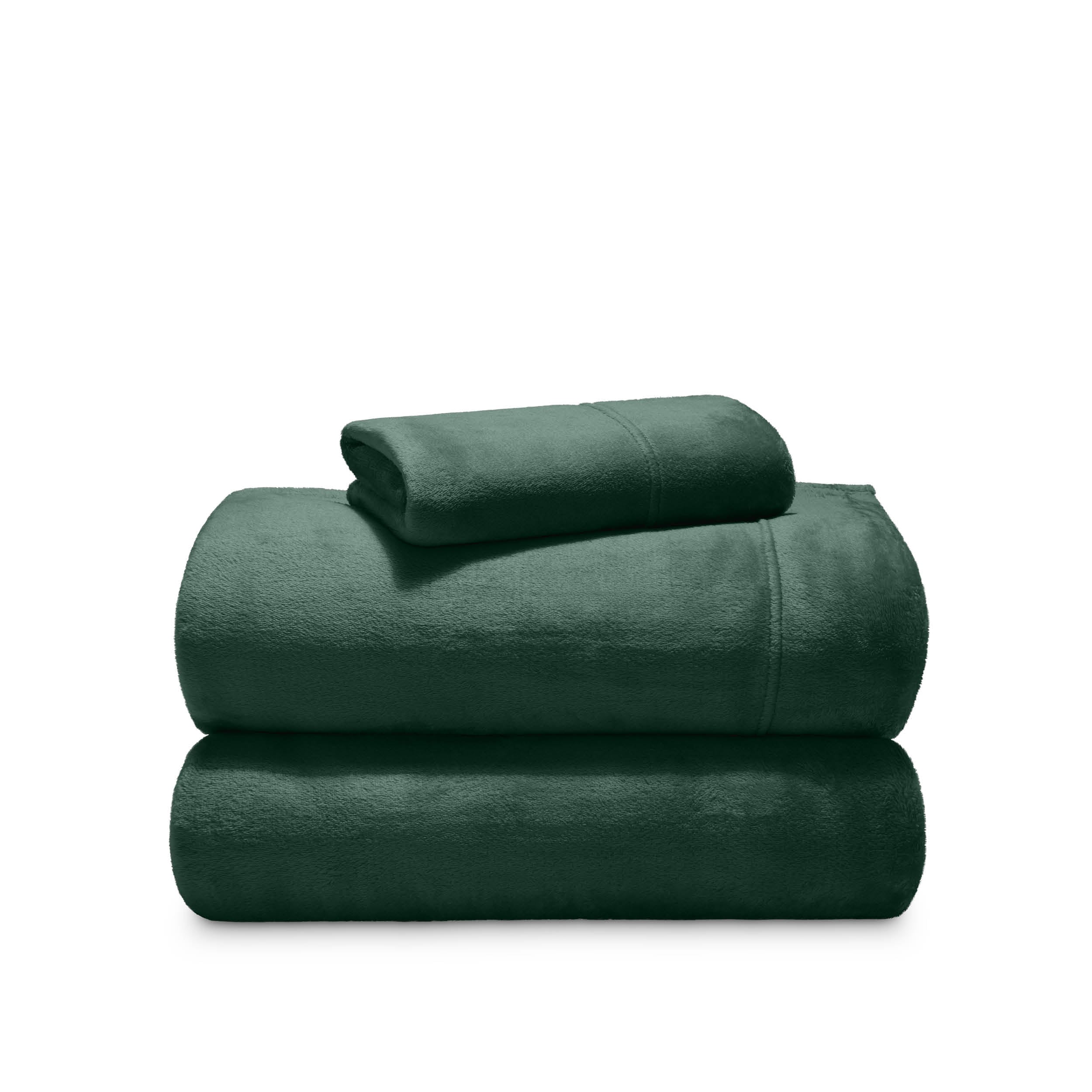 Stack of microplush sheets on a white background