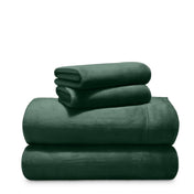 Stack of microplush sheets on a white background