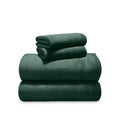 Stack of microplush sheets on a white background