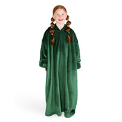 A girl is standing while wearing a long microplush wearable blanket