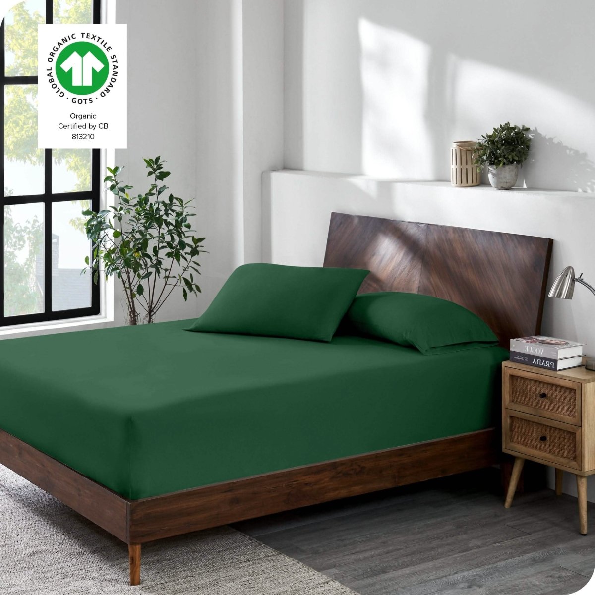 A modern bedroom with a jersey fitted sheet on the mattress with matching pillowcases