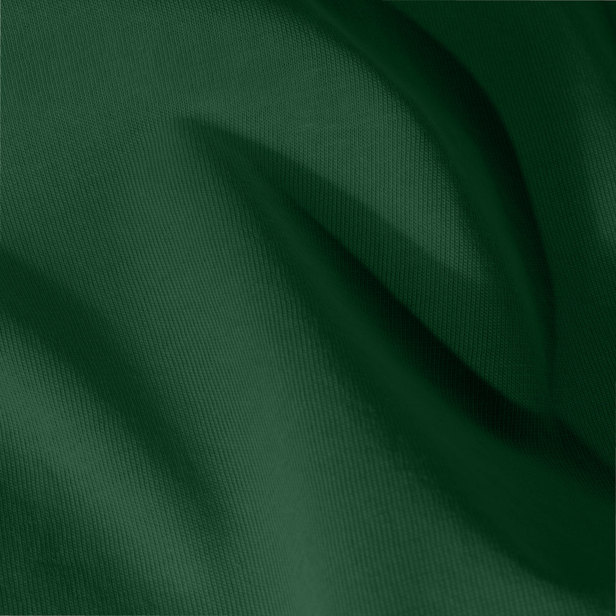 Close-up of jersey fitted sheet fabric with visible texture