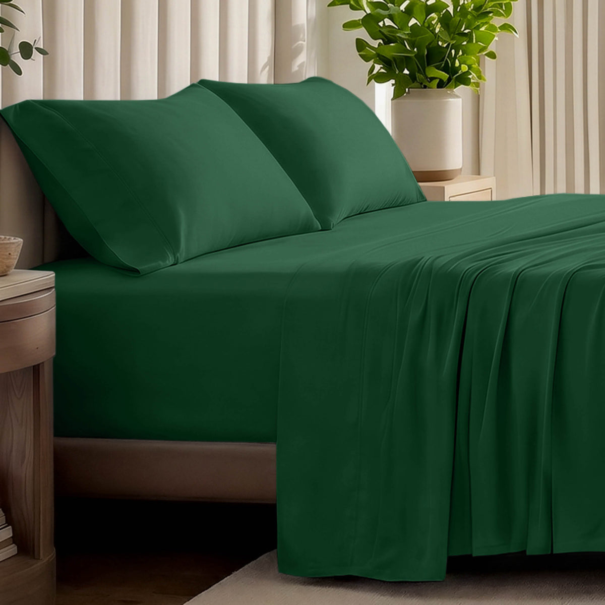 Organic jersey bed sheets and pillows on a bed with a wicker headboard.