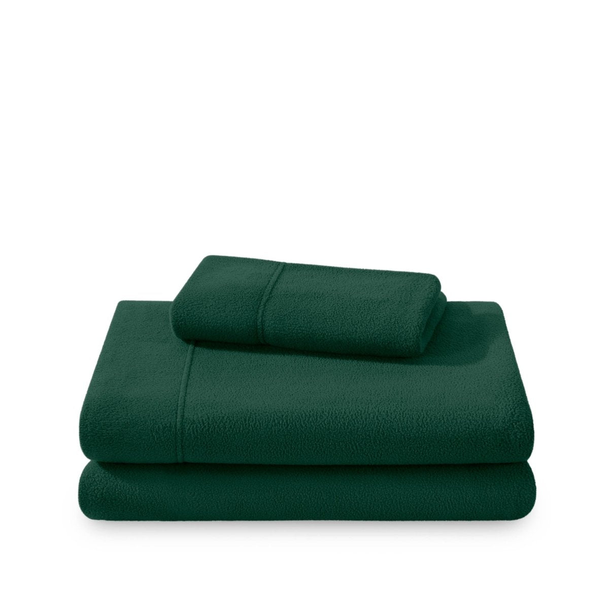 Polar fleece sheets and pillowcases folded and stacked on a white background