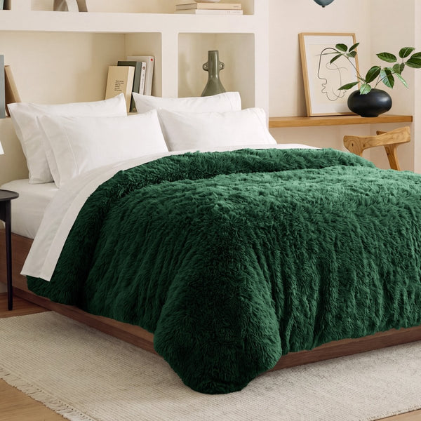 Shaggy duvet cover on a bed in a bedroom setting with shelves and decor.