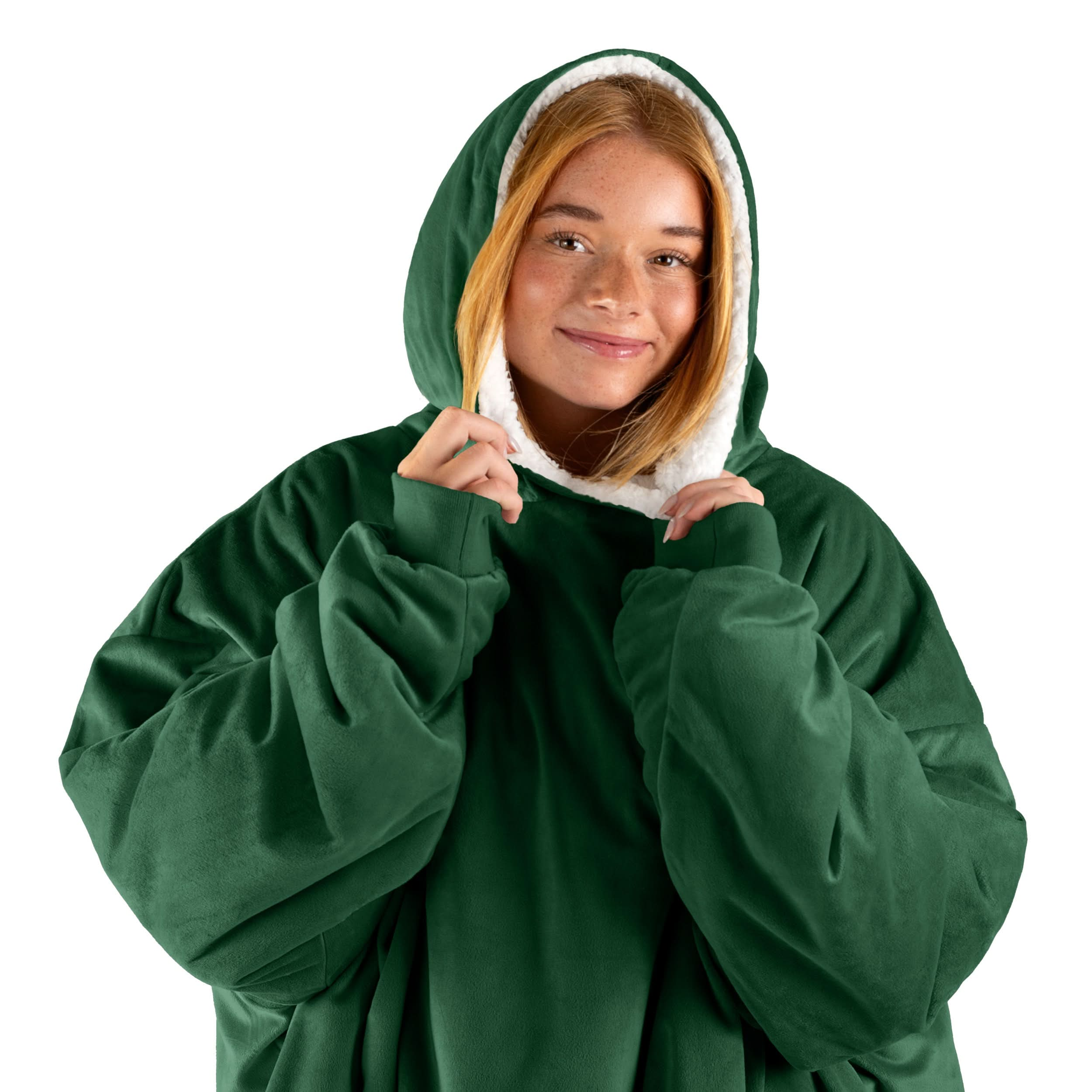 An adult with a wearable blanket on