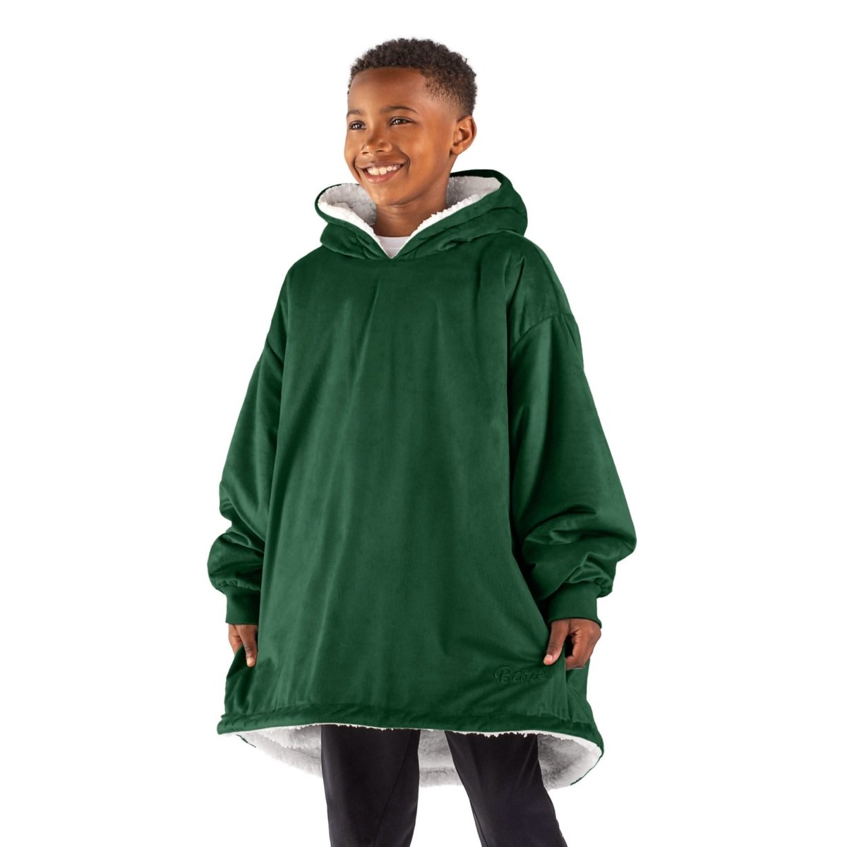 A child with a sherpa wearable blanket on