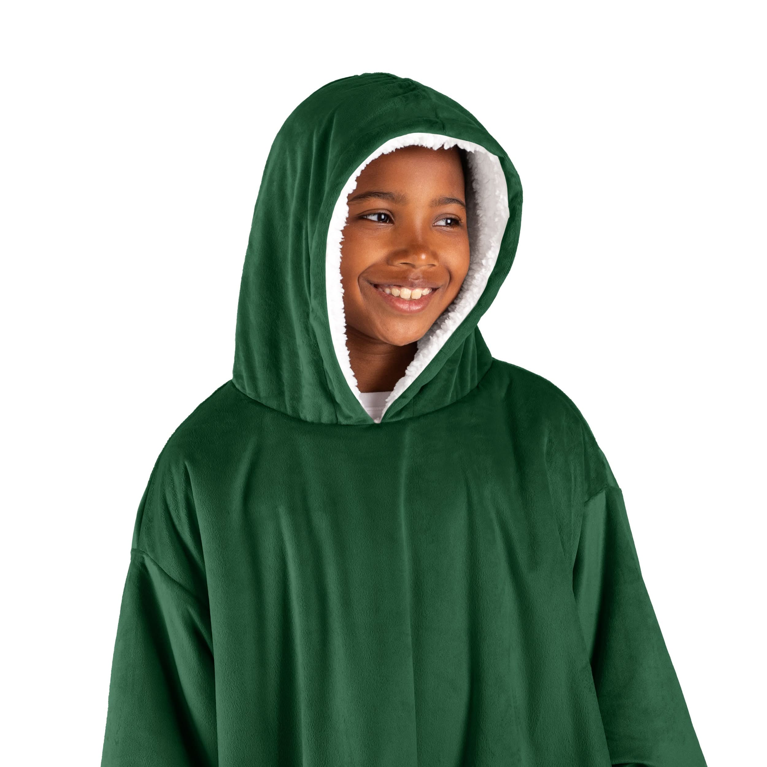 A boy has a wearable blanket on