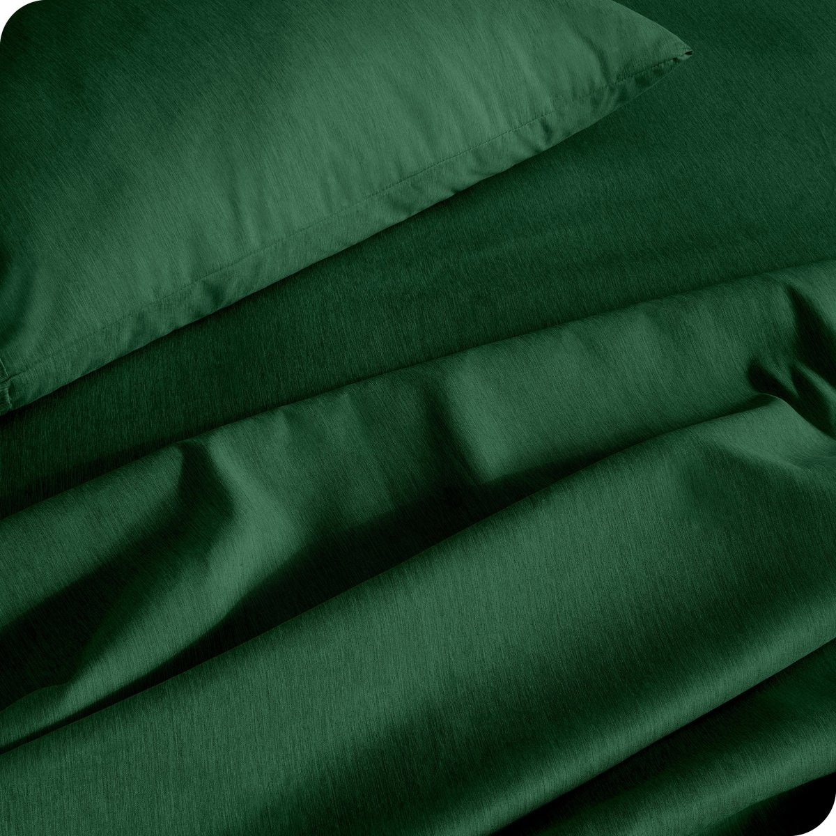 Close up of a heather sheet set on a bed