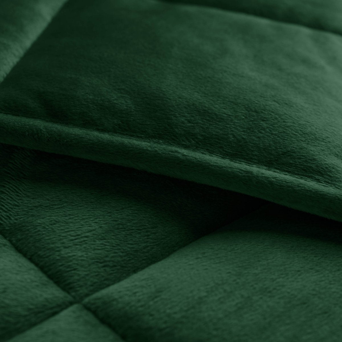 Close-up of a weighted blanket showing the stitching and texture
