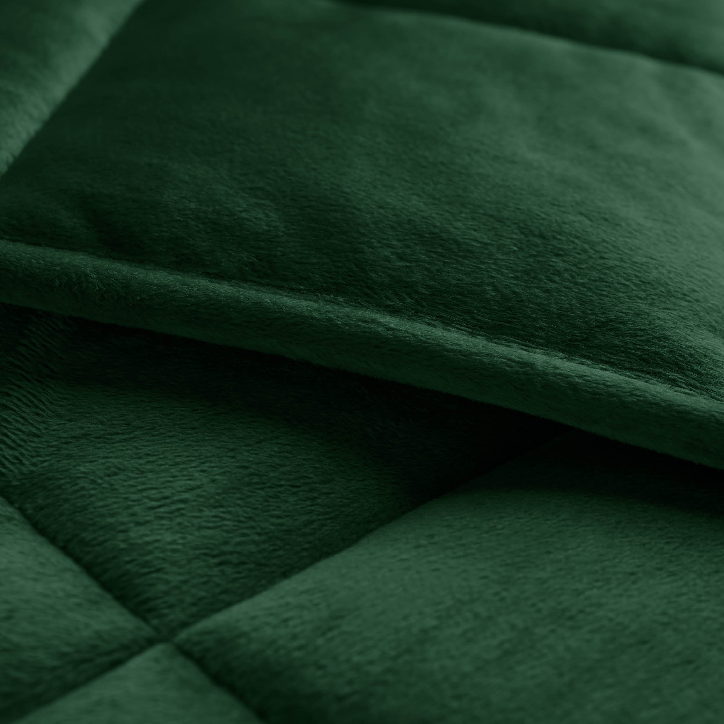 Close-up of a weighted blanket showing the stitching and texture
