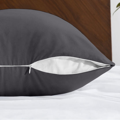 Body pillowcase with a zipper closure on a bed with a wooden headboard