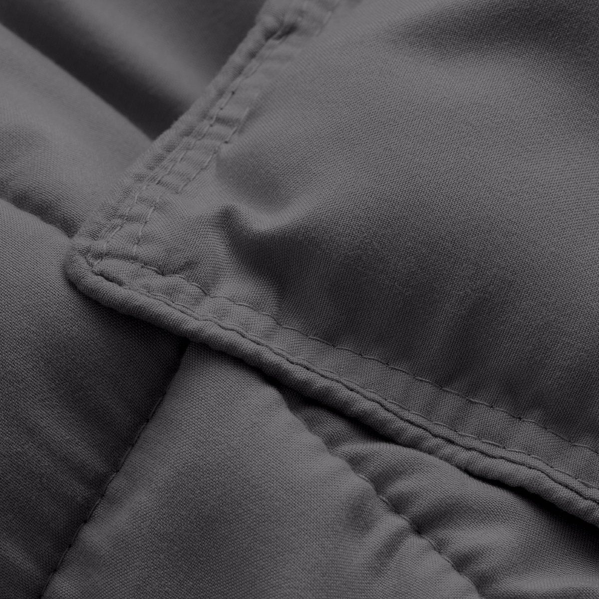 Close-up of comforter fabric with stitching detail