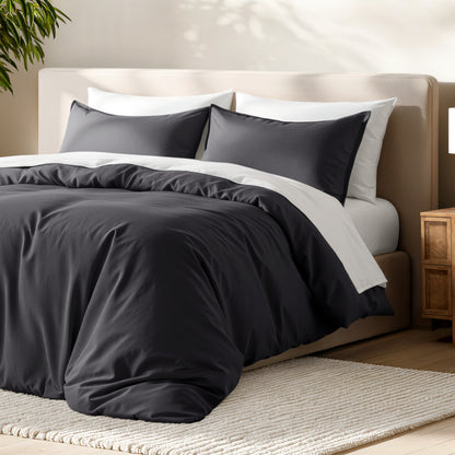 Bed with microfiber duvet cover and sham set in a bedroom setting.