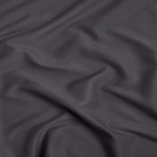 A close-up of ultra soft sheet fabric with soft folds and a smooth texture