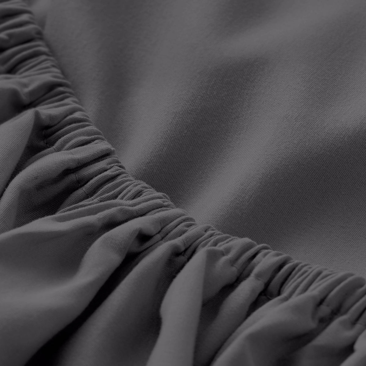 Close-up of fitted sheet with all around elastic