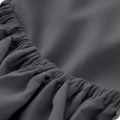 Close up of a fitted sheet with all around elastic
