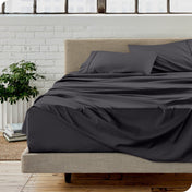 A modern bedroom with microfiber sheets on the mattress