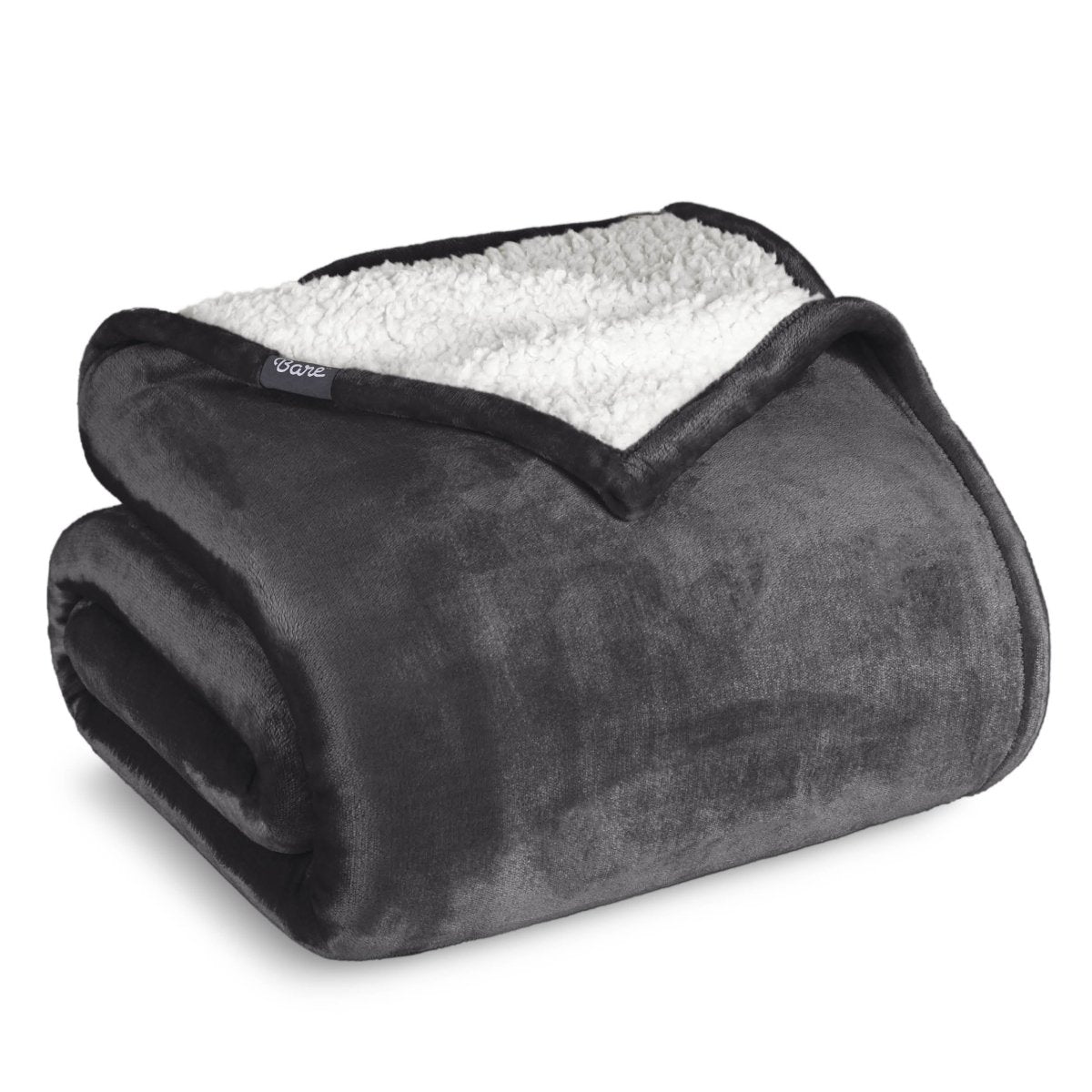 A sherpa blanket folded neatly while showing both sides