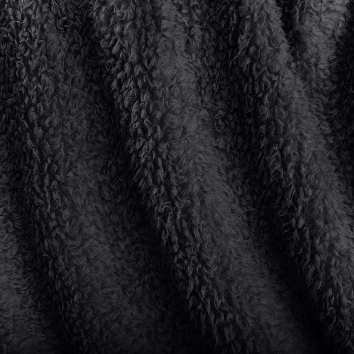 Close-up of textured faux shearling blanket