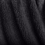 Close-up of textured faux shearling blanket