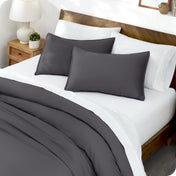 Matching TENCEL™ duvet cover and pillow shams on a bed