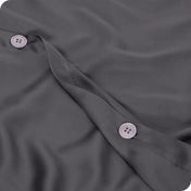 Close up of the buttons on a TENCEL™ duvet cover