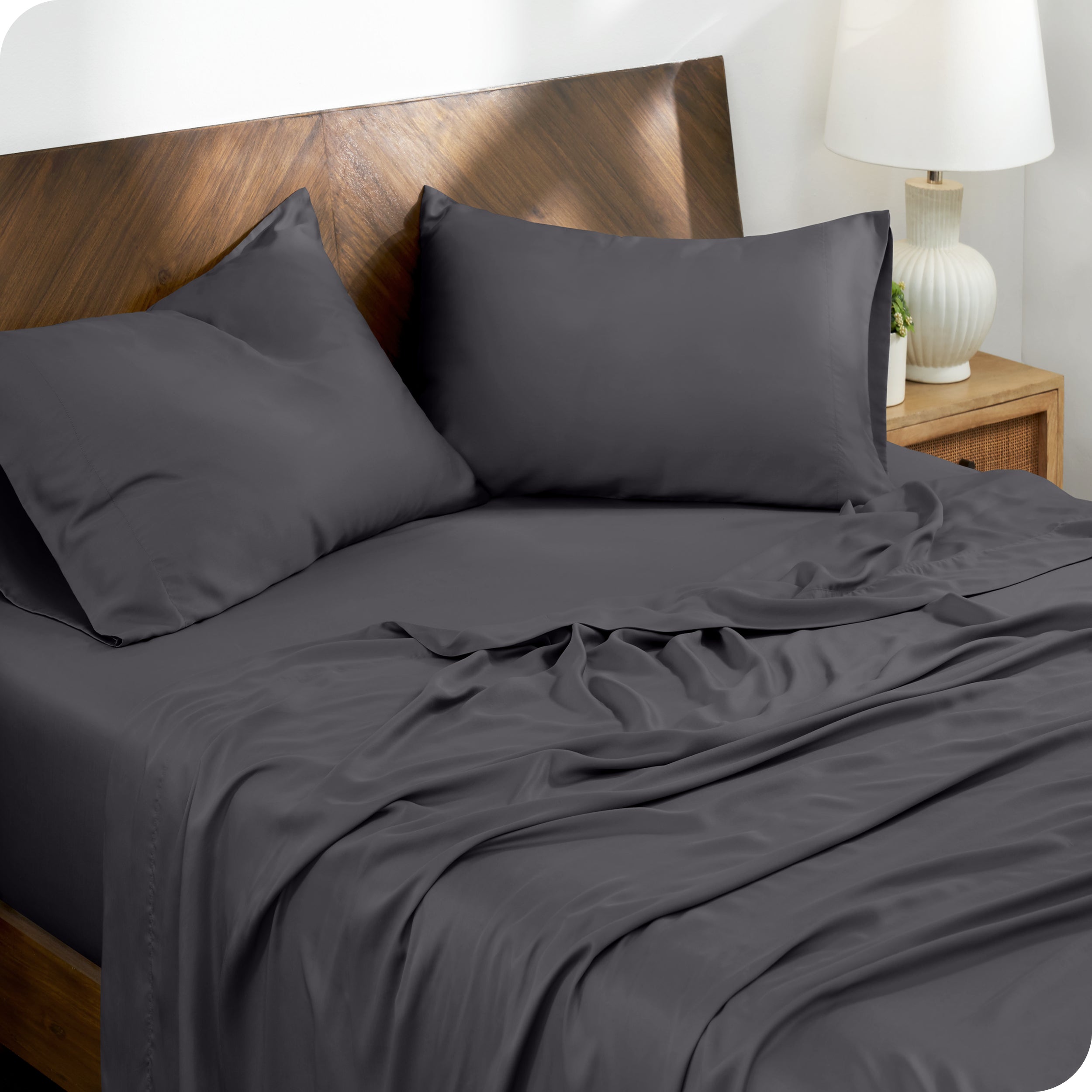 TENCEL™ Lyocell sheets on a bed. The flat sheet is folded over itself slightly.
