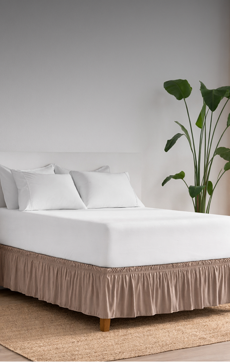 Bed with wrap around bed skirt