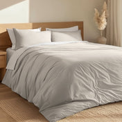 A bedroom with percale bedding