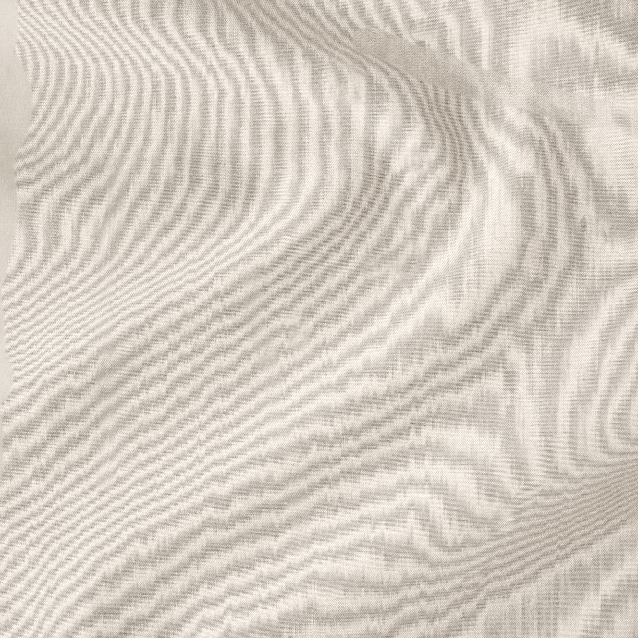 Close-up of the corner ties and button on the percale duvet cover